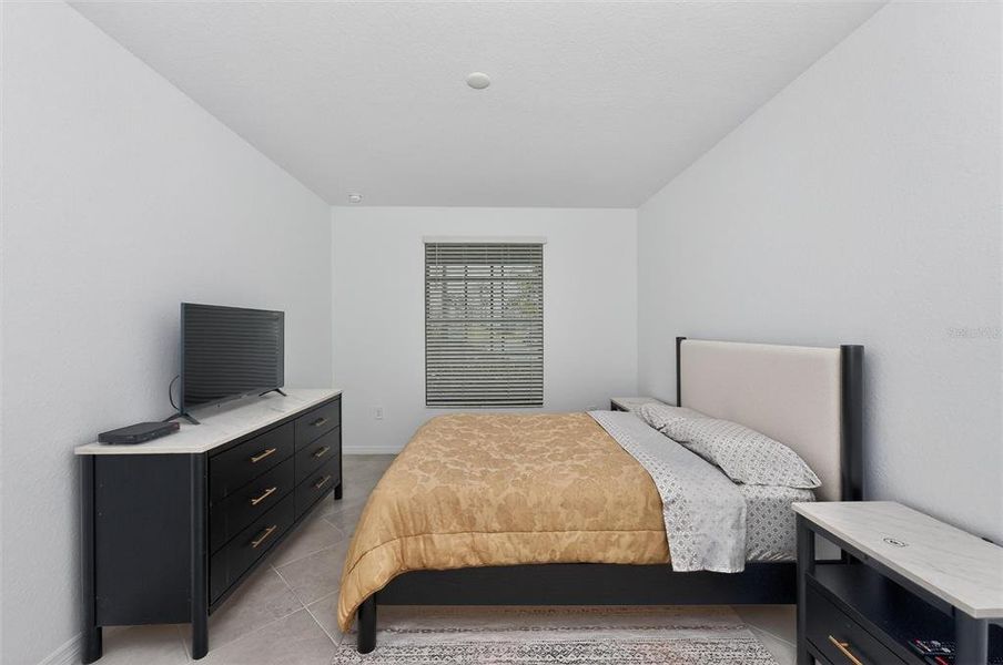 Furnished interior view inside a new home in Wellen Park Golf & Country Club, Venice (Image 40).