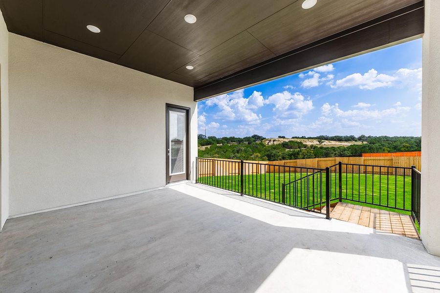 Exterior details and patio area of a home in Lariat - 80', Liberty Hill (Image 3). Exterior details and patio area of a home in Lariat - 80', Liberty Hill (Image 3).