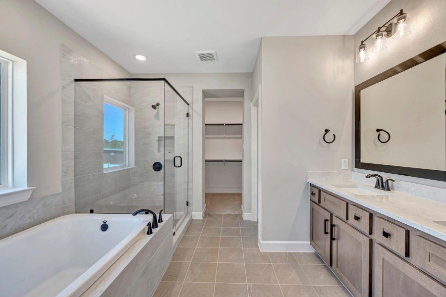 Furnished interior view inside a new home in COLTON - Reserve Collection, Todd Mission (Image 6).