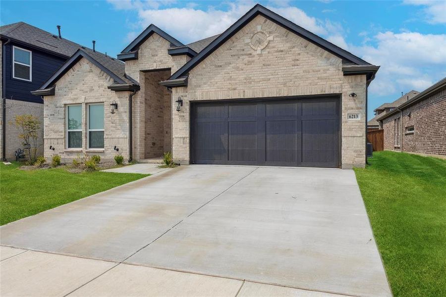 Front exterior of a new home in , Celina, TX, highlighting curb appeal (Image 23).