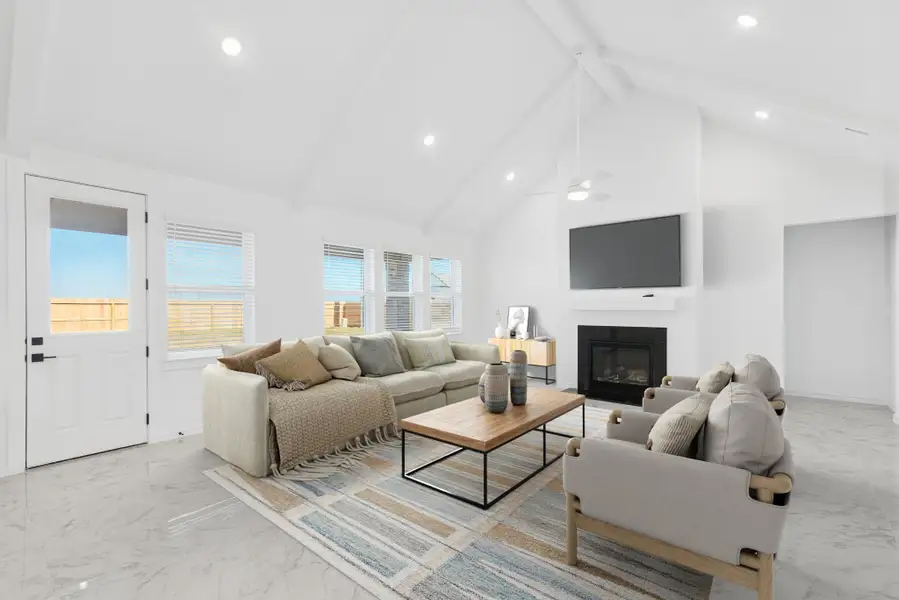 Open great room with cozy fireplace (*Photo not of actual home and used for illustration purposes only.)