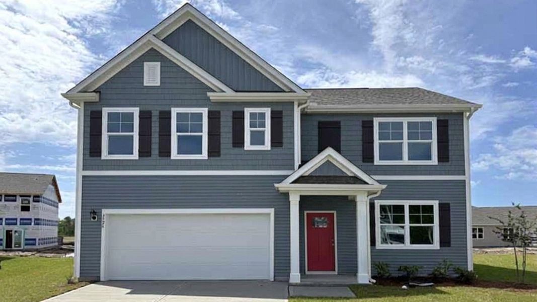 Front exterior of a new home in Cedar Hill Landing, Navassa, NC, highlighting curb appeal (Image 1). Front exterior of a new home in Cedar Hill Landing, Navassa, NC, highlighting curb appeal (Image 1).