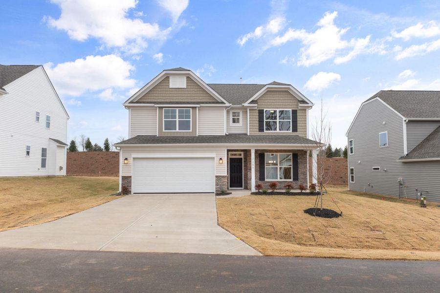 Front exterior of a new home in Pisgah Park, Kernersville, NC, highlighting curb appeal (Image 2).