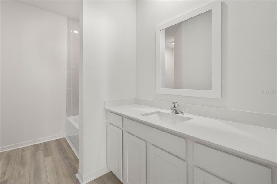 Furnished interior view inside a new home in Tula Parc, Astatula (Image 9).