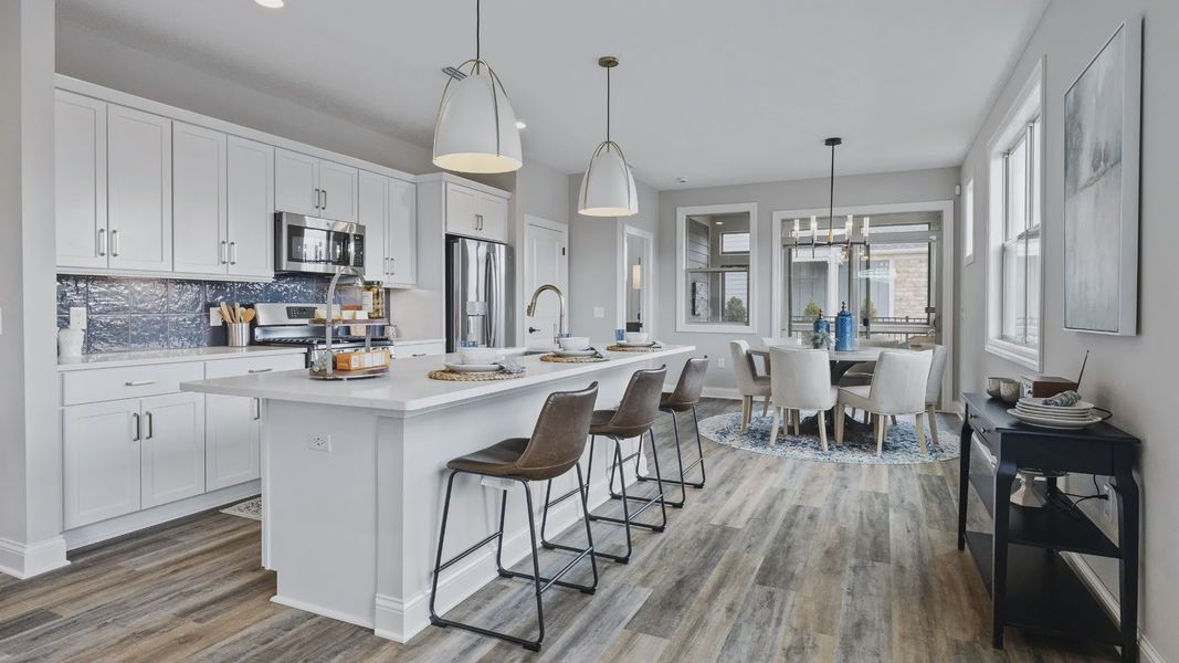 Representative furnished interior of a home built from the Cambridge by Epcon Communities in The Courtyards at Oak Grove, Durham (Image 12).