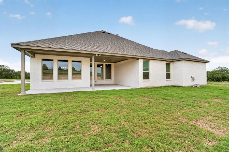 Exterior details and patio area of a home in Terra Vista Estates, Springtown (Image 29).