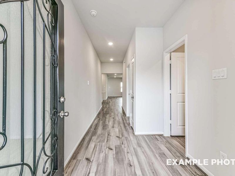 Spacious, unfurnished interior of a new home in Sunterra, Katy (Image 17).