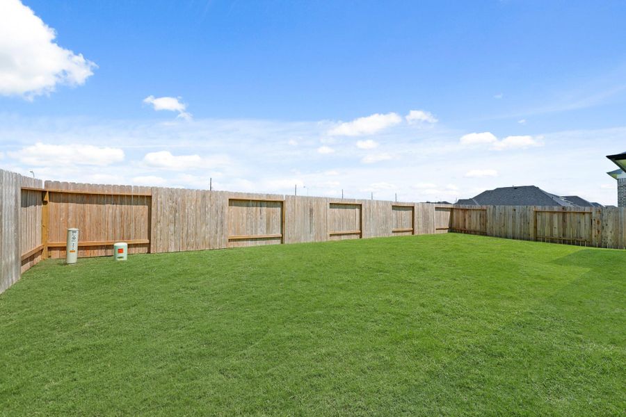 Front exterior of a new home in Briarwood Crossing, Rosenberg, TX, highlighting curb appeal (Image 20).