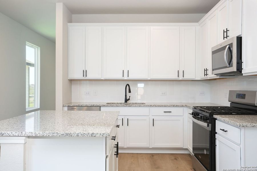 Furnished interior view inside a new home in Fairway Crossing 40s, San Antonio (Image 9).