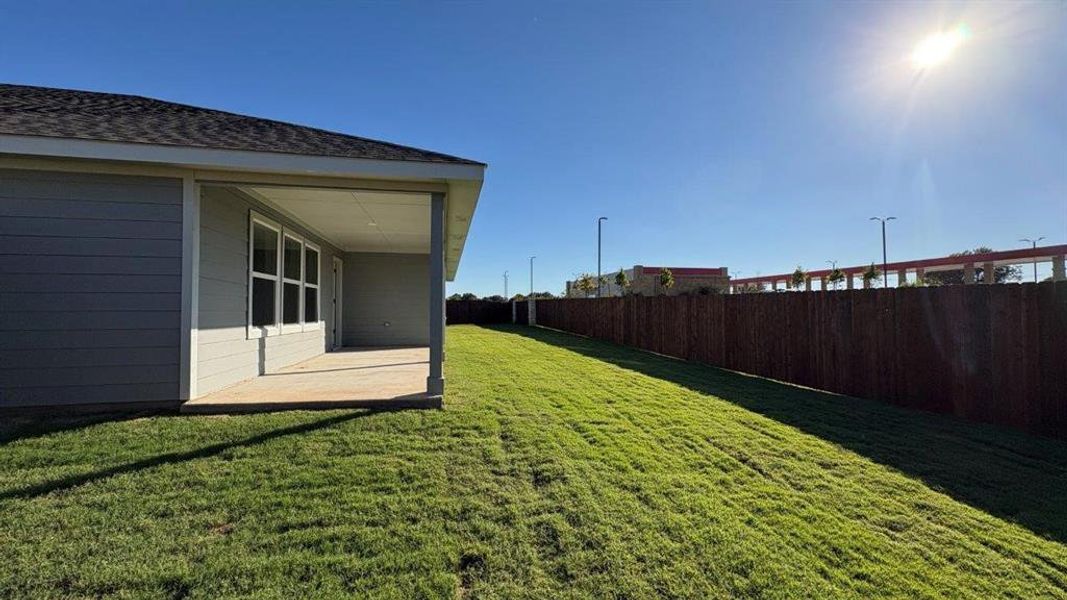 Exterior details and patio area of a home in Sandstone Estates, Granbury (Image 3).