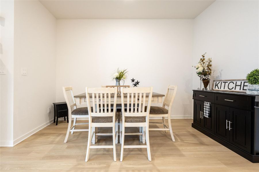 Furnished interior view inside a new home in Pinewood at Grand Texas, New Caney (Image 18).
