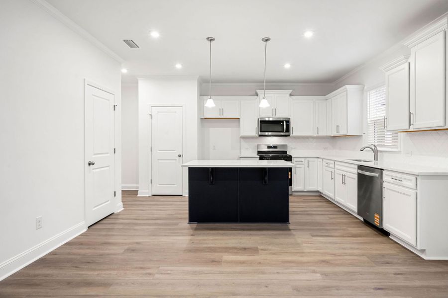 Furnished interior view inside a new home in Salem Bay, Beaufort (Image 8).