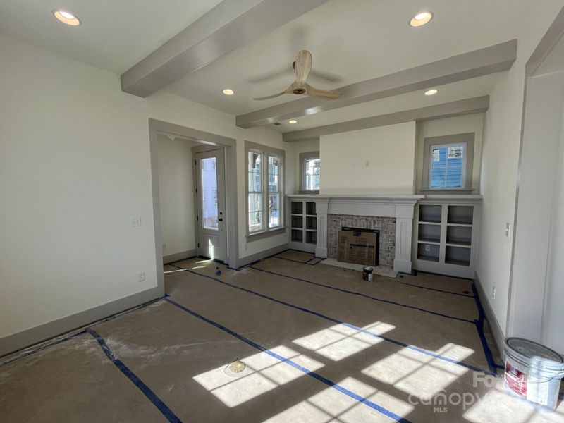 Family Room with Built Ins and Ceiling Beams