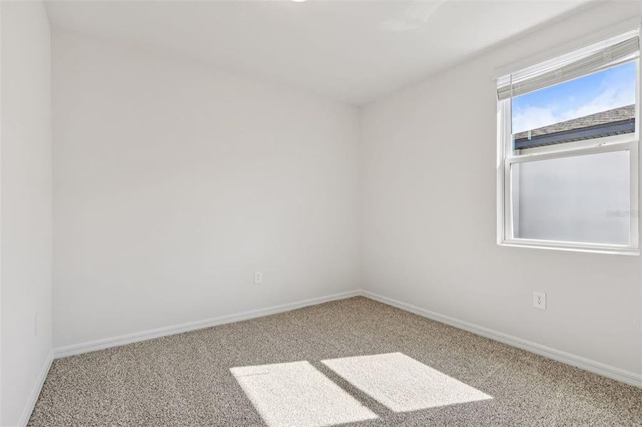 Spacious, unfurnished interior of a new home in Bradbury Creek - Signature Series, Haines City (Image 31).