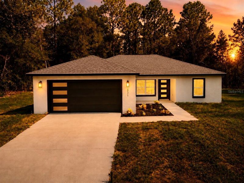 Front exterior of a new home in , Dunnellon, FL, highlighting curb appeal (Image 27).