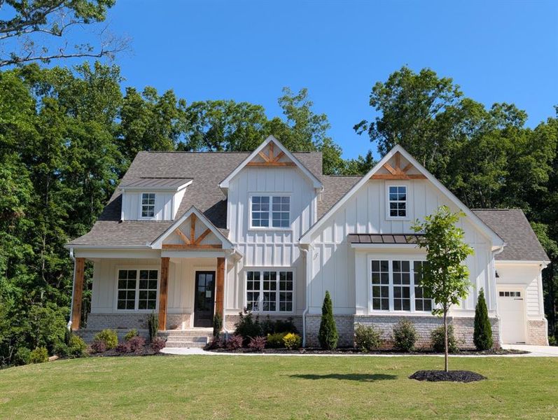 Front exterior of a new home in Arden on Lanier, Cumming, GA, highlighting curb appeal (Image 18).
