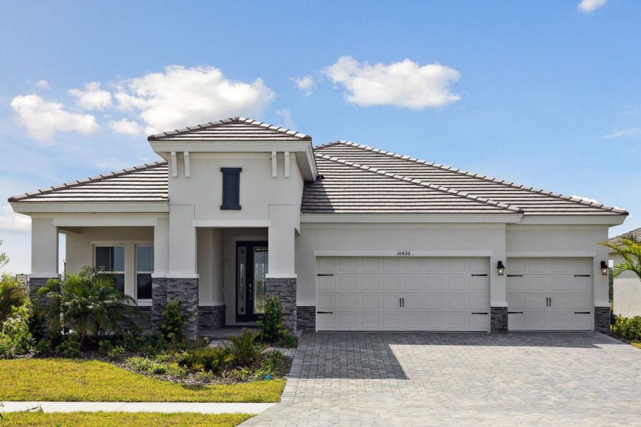 Representative exterior photo of a completed home built from the Biscayne I by Homes by WestBay in North River Ranch, Parrish, FL (Image 9).