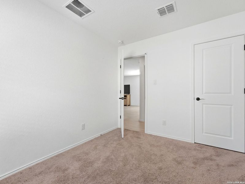 Spacious, unfurnished interior of a new home in Torian Village, San Antonio (Image 24).