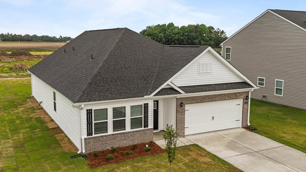 Front exterior of a new home in East Ridge, Ayden, NC, highlighting curb appeal (Image 16).