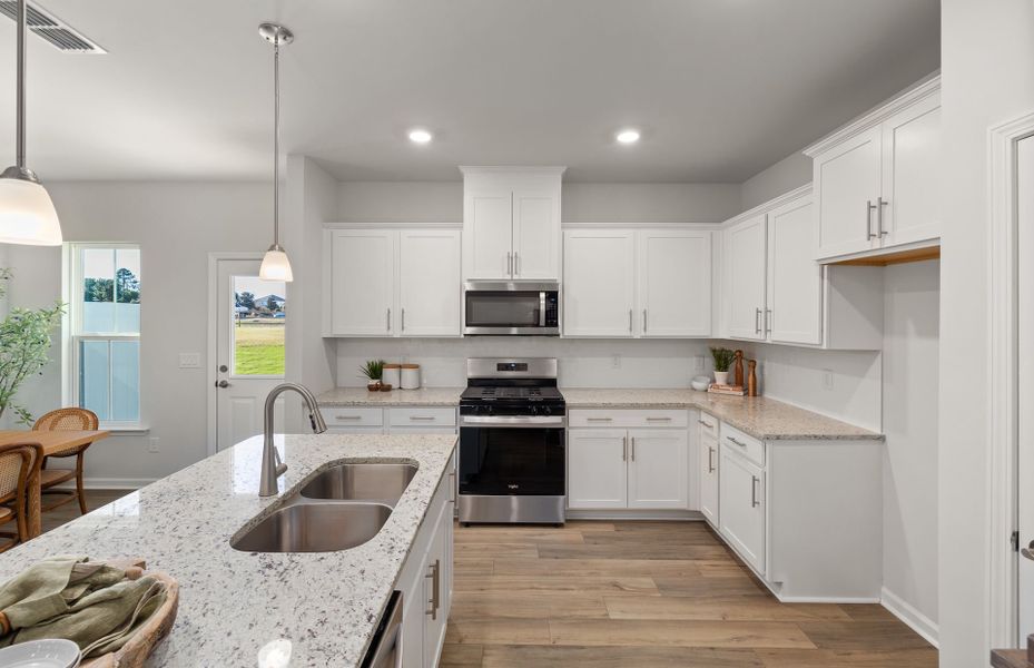 Furnished interior view inside a new home in Saunders Farm, Willow Spring (Image 7).