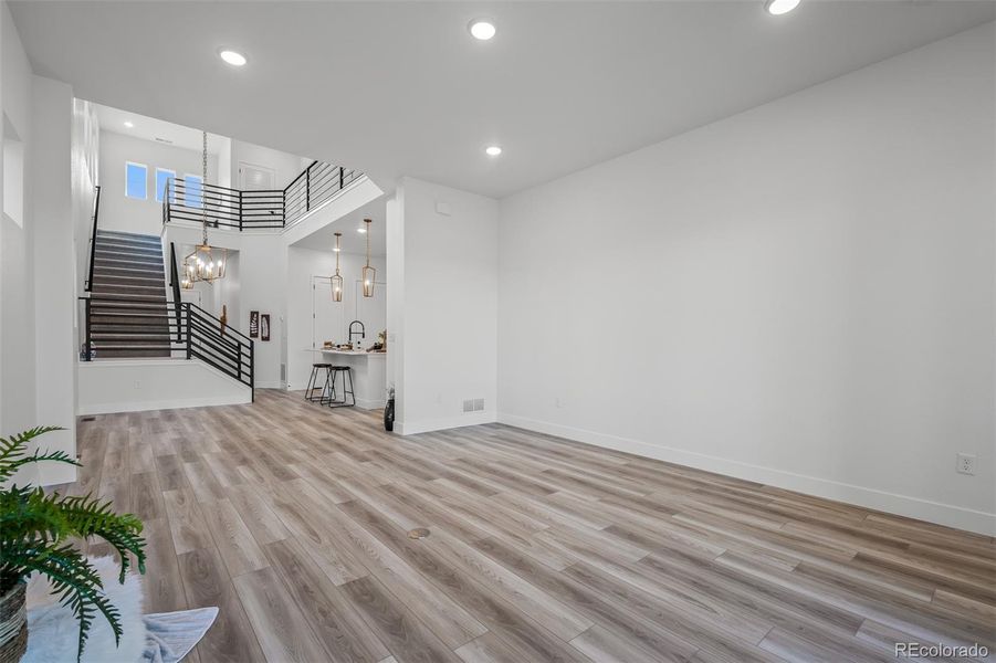 Spacious, unfurnished interior of a new home in Revel Crossing at Wolf Ranch - The Panorama Collection, Colorado Springs (Image 20).