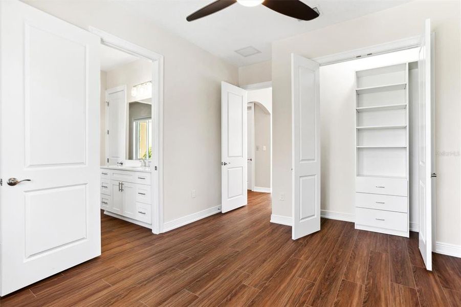 Guest Bedroom #3, also with custom closet system.