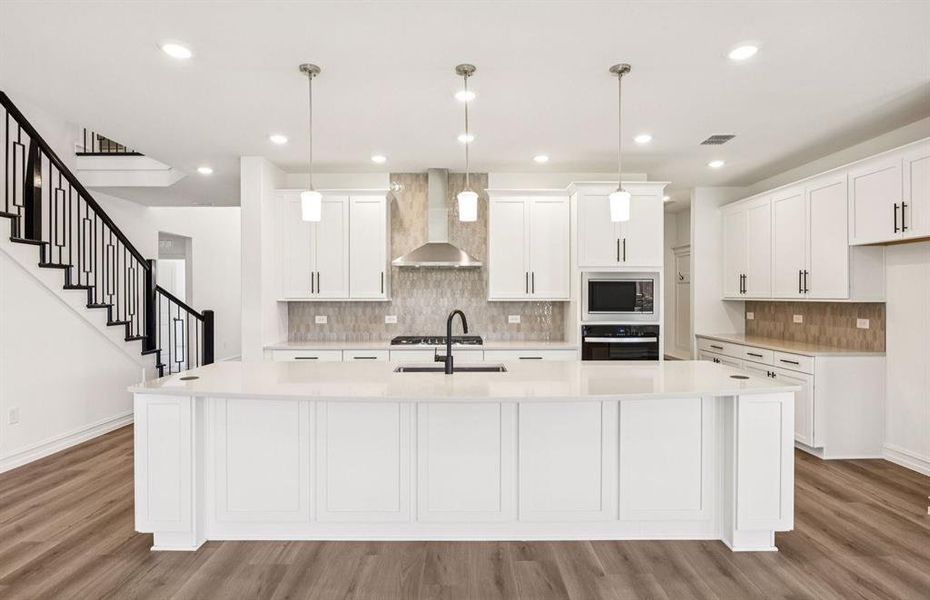 Kitchen featuring a large island ideal for informal dining and gatherings Kitchen featuring a large island ideal for informal dining and gatherings