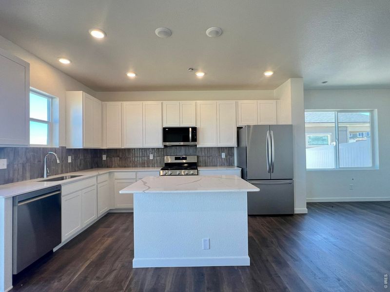 Furnished interior view inside a new home in Union Colony West, Greeley (Image 9).