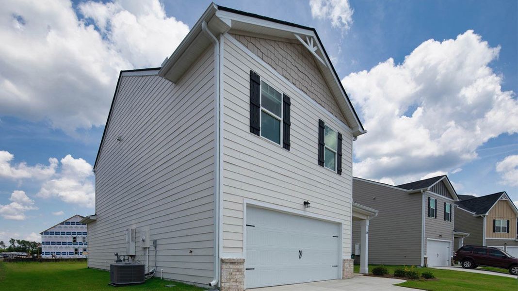 Representative exterior photo of a completed home built from the Edmon by D.R. Horton in Poplar Preserve, Newnan, GA (Image 16). Representative exterior photo of a completed home built from the Edmon by D.R. Horton in Poplar Preserve, Newnan, GA (Image 16).
