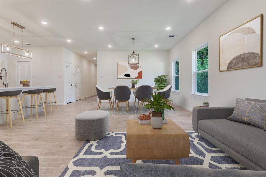 Living area featuring recessed lighting and light wood finished floors