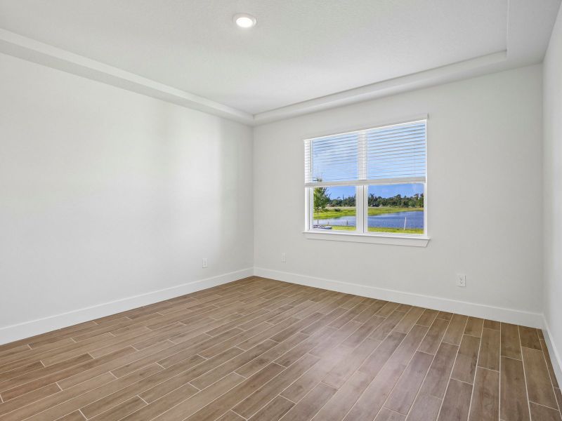 Spacious, unfurnished interior of a new home in Magnolia Bay - Reserve Series, Nokomis (Image 17).
