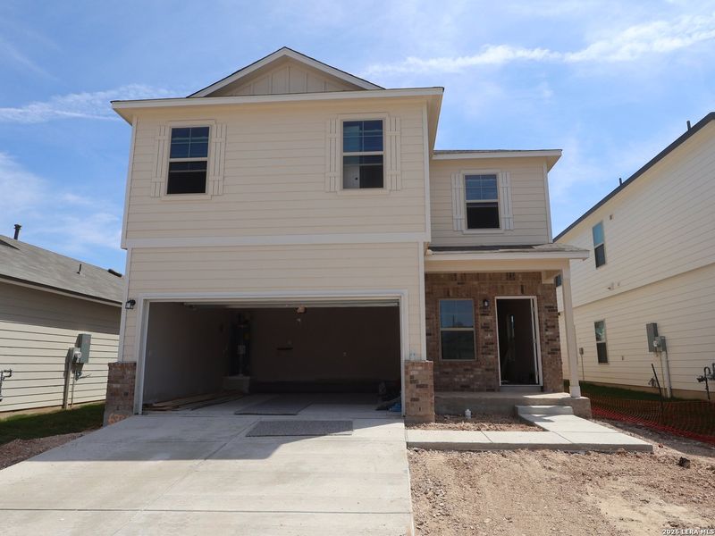 Front exterior of a new home in Winding Brook, San Antonio, TX, highlighting curb appeal (Image 2). Front exterior of a new home in Winding Brook, San Antonio, TX, highlighting curb appeal (Image 2).
