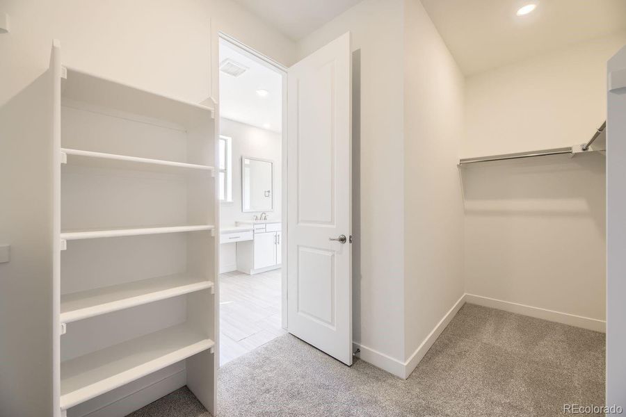 Spacious, unfurnished interior of a new home in Red Rocks Ranch: The Grand Collection, Morrison (Image 10).