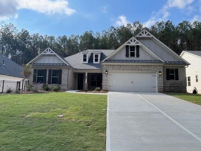 Front exterior of a new home in Soleil Belmont Park, Canton, GA, highlighting curb appeal (Image 1). Front exterior of a new home in Soleil Belmont Park, Canton, GA, highlighting curb appeal (Image 1).