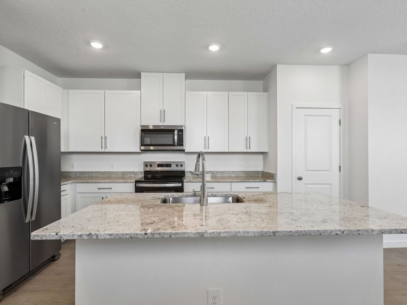 Furnished interior view inside a new home in The District at Oakleaf - The Commons, Middleburg (Image 6).