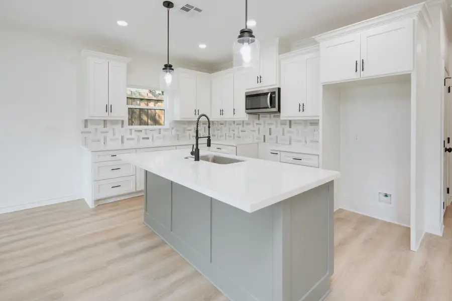 **Photos are of a previously built home with the same floorplan. Finishes are similar but not exact.