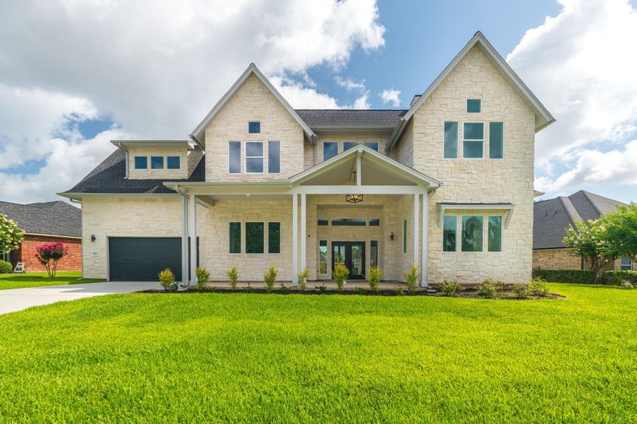 Front exterior of a new home in , Montgomery, TX, highlighting curb appeal (Image 22).