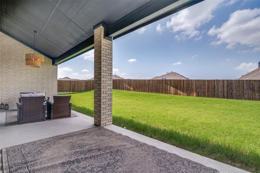 Exterior details and patio area of a home in Woodcreek, Fate (Image 3).