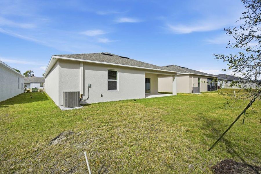 Exterior details and patio area of a home in Palm Wind, Hudson (Image 3). Exterior details and patio area of a home in Palm Wind, Hudson (Image 3).