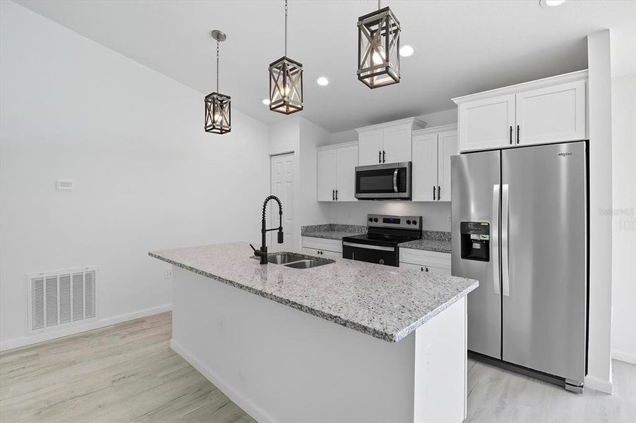 Furnished interior view inside a new home in , Dunnellon (Image 6).