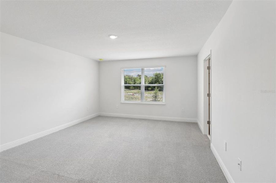 Spacious, unfurnished interior of a new home in The Reserve at Hammock Oaks - Classic Series, Lady Lake (Image 25). Spacious, unfurnished interior of a new home in The Reserve at Hammock Oaks - Classic Series, Lady Lake (Image 25).