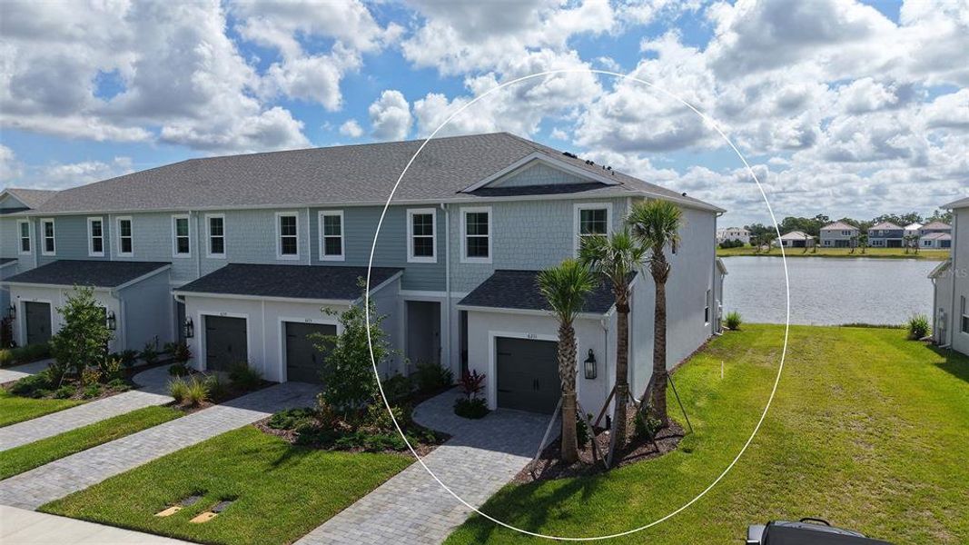 Front exterior of a new home in , Sarasota, FL, highlighting curb appeal (Image 21).