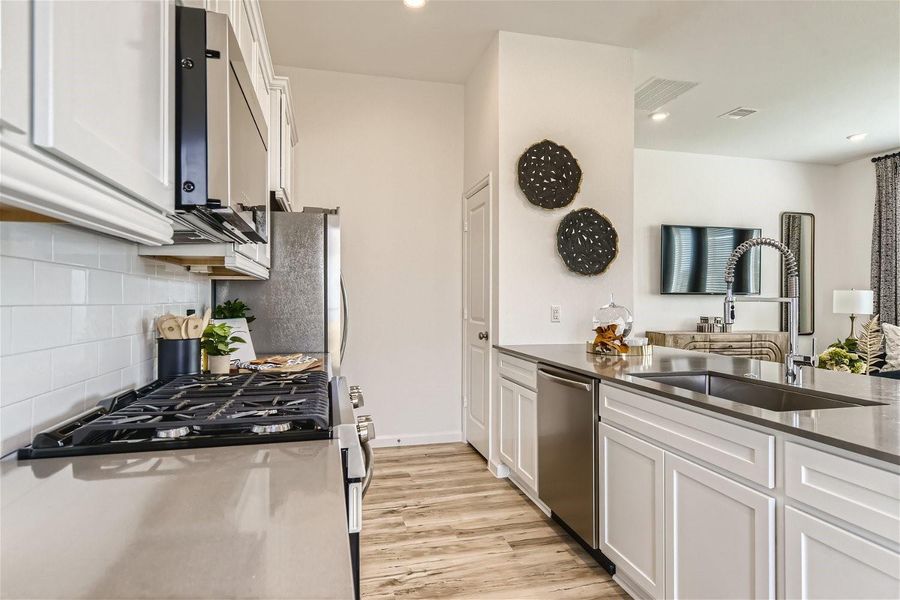 Furnished interior view inside a new home in Bridgeland, Cypress (Image 7).