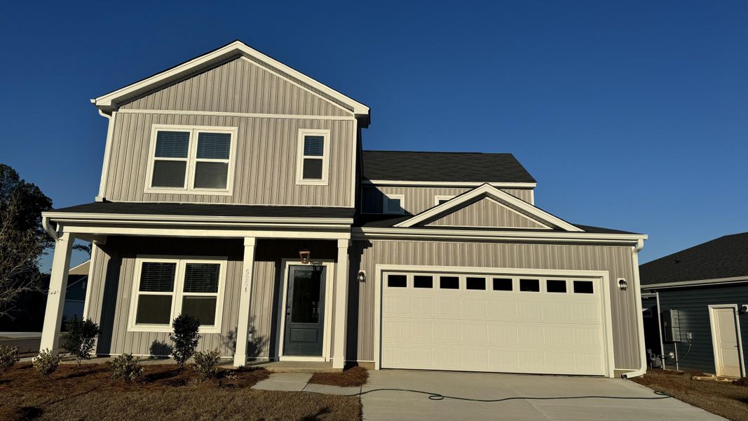 Front exterior of a new home in , Summerville, SC, highlighting curb appeal (Image 31). Front exterior of a new home in , Summerville, SC, highlighting curb appeal (Image 31).