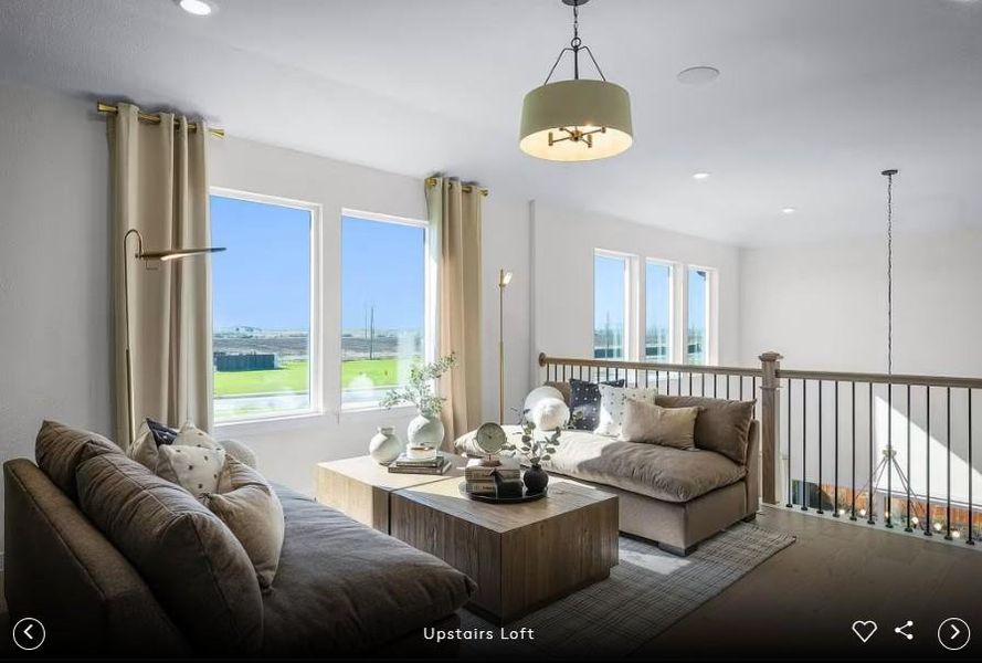 Interior photos- Photo of Pulte model home with same floor plan, not of actual home listed.