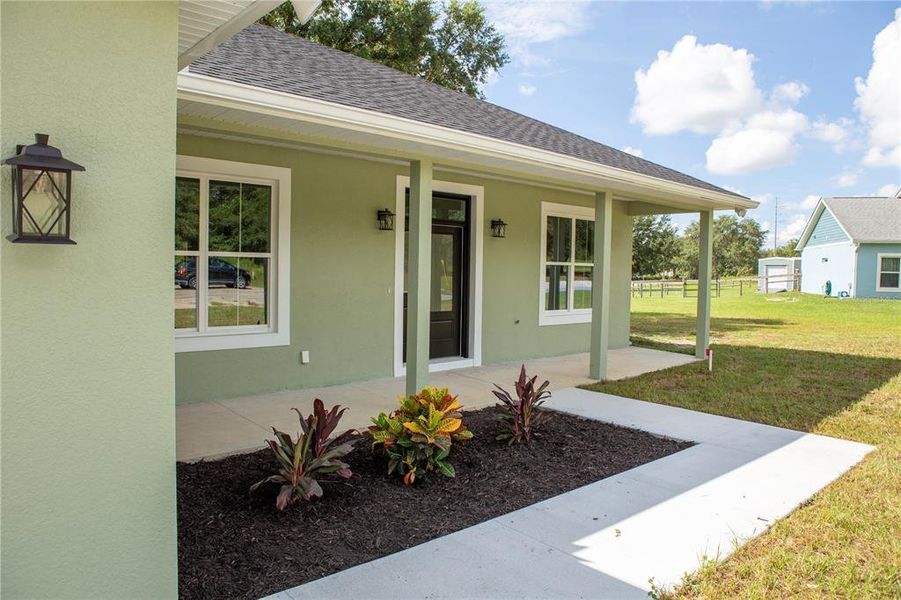 Front exterior of a new home in , Citrus Springs, FL, highlighting curb appeal (Image 2).