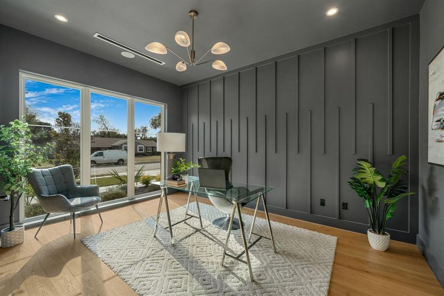 Office area with a decorative wall, light wood-style floors, a chandelier, and recessed lighting Office area with a decorative wall, light wood-style floors, a chandelier, and recessed lighting