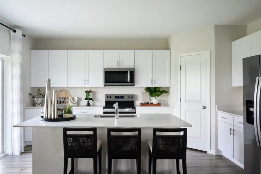 Furnished interior view inside a new home in Scenic Terrace, Haines City (Image 4).