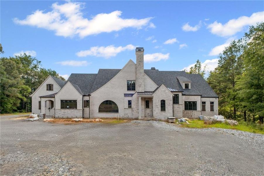 Front exterior of a new home in , Milton, GA, highlighting curb appeal (Image 20).