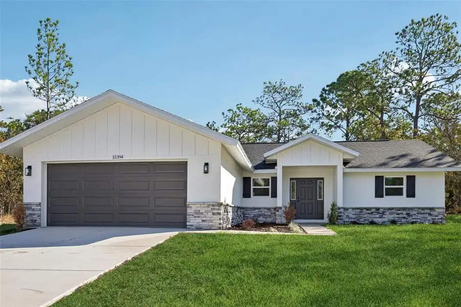 Front exterior of a new home in , Brooksville, FL, highlighting curb appeal (Image 1). Front exterior of a new home in , Brooksville, FL, highlighting curb appeal (Image 1).